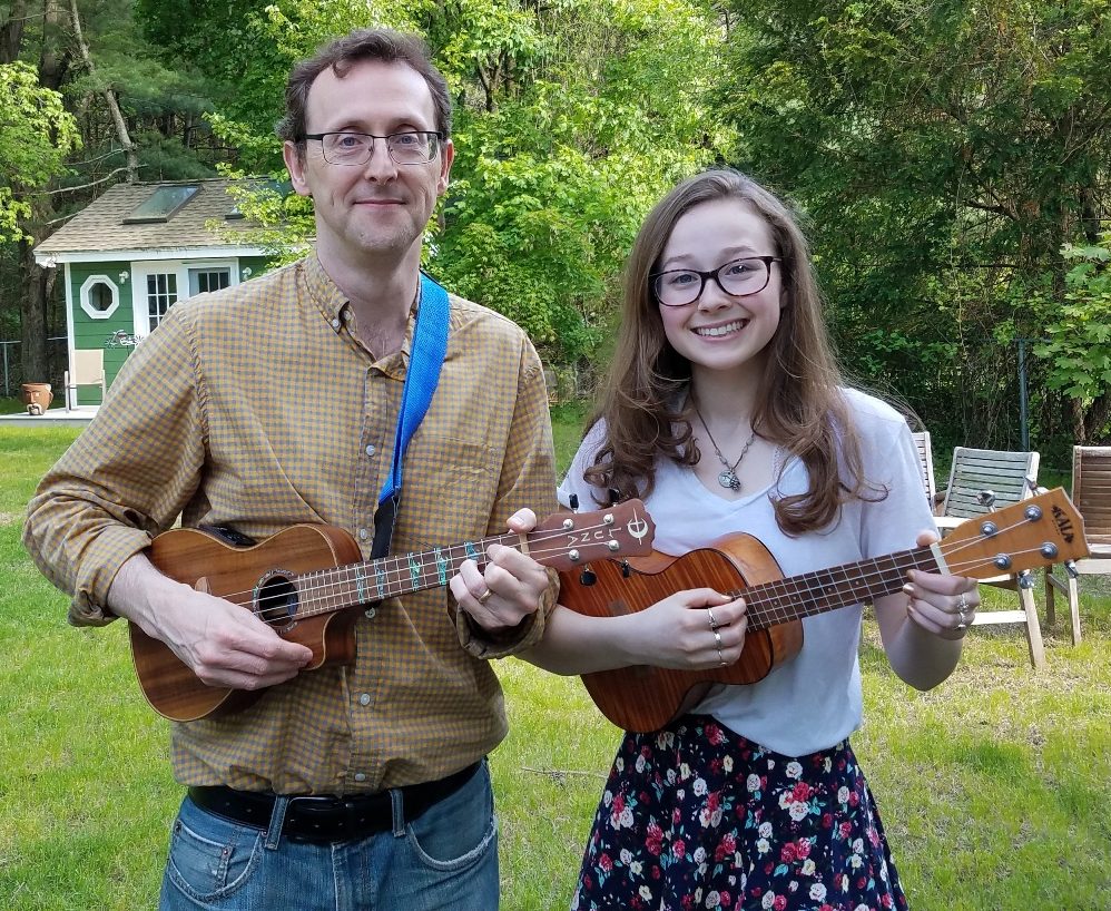 Mark and Zoe pose with their ukuleles